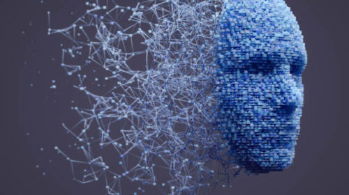 3D human head made with interconnected cube shaped particles.